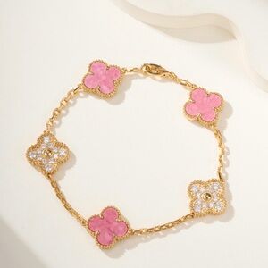 Van Cleef & Arpels Gold Bracelet with Pink Clover Motifs